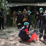 Sabato la polizia e i soccorritori esaminano le prove nel monastero di Pa Nakhon Chaibovorn, in una foresta nella provincia di Phichit, dopo aver risposto alle segnalazioni di cadaveri utilizzati nelle pratiche di meditazione. (Schermate)